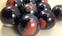 Picture of M214  1-in. Black Base With Orange and White Swirls Glass Marbles