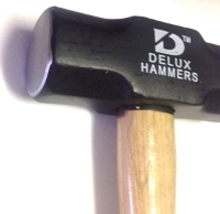 SledgeHammer with wooden handle 4lb closeup head