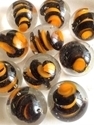 Picture of MM3045C HANDMADE 25mm set of 10, Clear w/black & orange swirls